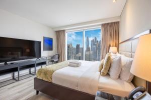 Vacationer Holiday Homes l Bright 1 Bedroom l Marina & Yacht Views l Pool access & Free Wi-Fi