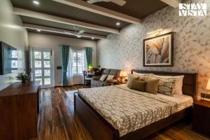StayVista at The Ivory Courtyard with Pool & BBQ
