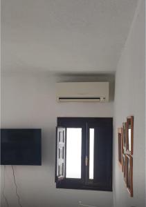 Luminoso y cómodo apartamento, a 2 minutos andando de la playa y a 1 de la plaza