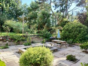 Croft Cottagein acres of mature gardens