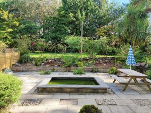 Croft Cottagein acres of mature gardens