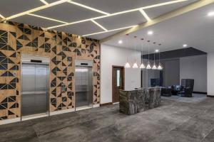 El Mufasa Skynest - Urban Luxury with Balcony, Infinity Pool, Gym & Sauna