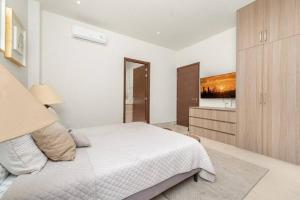 Waterfront condo with pool & gym access