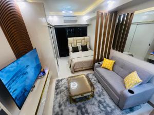 Modern Makati Condo with Balcony & Cityscape Views