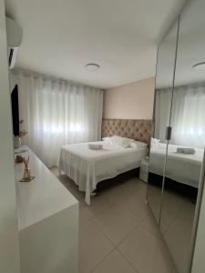 Apartamento suíte com estacionamento
