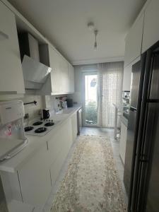 Konyaaltı gürsu denize sıfır sahilde full eşyalı lüks daire