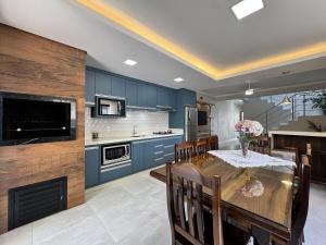 CASA SERINGUEIRAS - Linda casa na Praia de Palmas a 6 minutinhos do mar