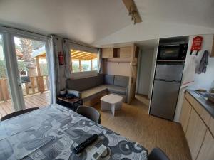 Mobil-home climatisé, tout confort, 3 chambres, sans vis à vis, dans camping 4 étoiles à La Presquile du Barcares
