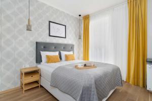 Ekskluzywny Apartament Blisko Centrum z Balkonem i Parkingiem by Renters Prestige