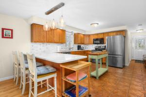 Dog-Friendly Cape Home with Propane Fire Tabletop