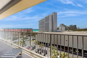 Beachfront Condo with Balcony Pools and Gym