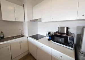 Wake Up to the Ocean Serene Seafront 1 BR