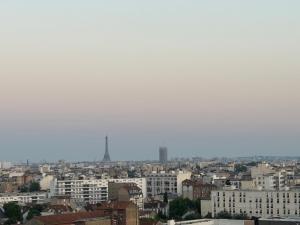 Enjoy Eiffel Sparkle from Your Balcony