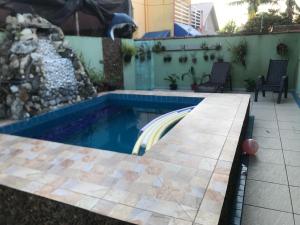 Casa com piscina em Peruíbe