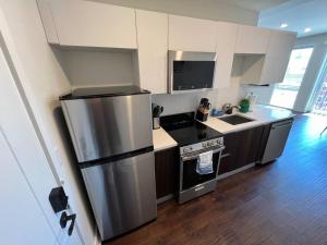 Private Balcony - Gorgeous Center City Bilevel Apt