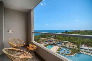 Cozy studio with ocean and pool views