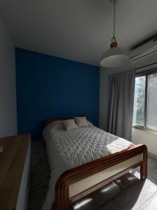 Casa con galería y parrilla techada