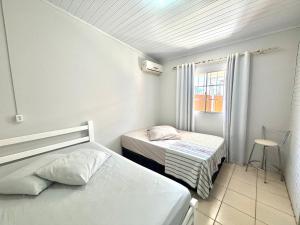 Casa aconchegante apenas 2 quadras do mar!
