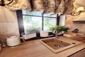 Holiday home with sauna and whirlpool