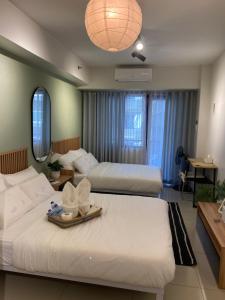 Mikhail Cozy Pad at Sea Residences near MOA NAIA