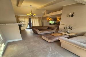 Holiday home with sauna and whirlpool