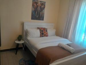 celestial comfort apartments with ample parking space, swimming pool, modern equipped gym, and amazing city views