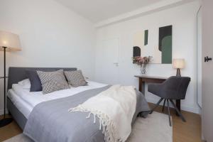 Luxury Two-Bedroom Apartment with a Balcony in Warsaw by Renters Prestige