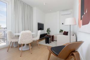 Luxury Two-Bedroom Apartment with a Balcony in Warsaw by Renters Prestige