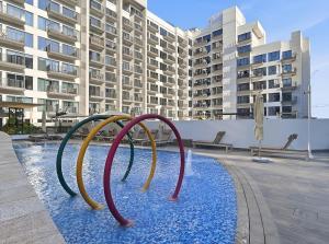 Modern Studio in Azizi Mirage with Pool & Gym access