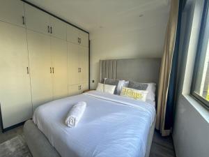Elegant 2BR Residence, Balcony, Gym & Secure Living