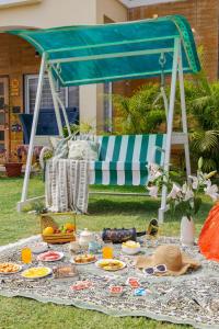 Deepti 3BHK Villa Projector Pool by Homeyhuts