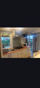 Bungalow camping 4 étoiles, piscine chauffée, clim