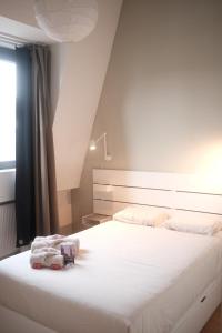 Stylish 1BR duplex met lift en balkon nabij Zuid met Gratis Parking