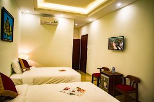 Phòng 2 Giường Đơn Nhìn Ra Khu Vườn (Twin Room with Garden View)