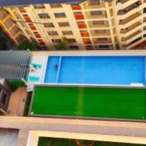 Royal essence apartment with heated swimming pool ,ample parking ,fully equipped gym, child playground and amazing scenic city view