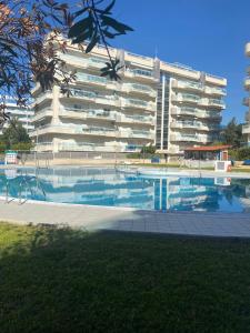 Apartamento tipo Resort, cerca playa, con parking