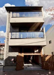 Heart of Ikebukuro 3-Minute Walk from Kita-Ikebukuro Station Zen-Style Courtyard Designed by a Professional 3 Bedrooms LivingDining Room Sleeps 8 Two Bathrooms