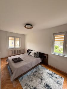 Modern 2BR Apartment Karpoš with Private Parking