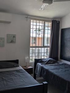 Cuarto Privado, Gran Wi-Fi, Jacuzzi Rooftop, AC