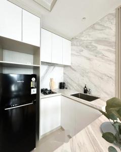 Kota Casablanca mall connected newly 2 bedroom apartment 75 sqm stylish furniture new best facilities building casa grand super hygiene