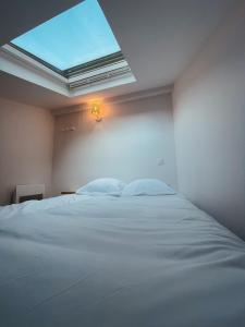 Studio Coquetty petit duplex paisible sur cour