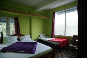 Syntilla Silver Cascade Inn - Near Silver Cascade Falls, Kodaikanal, Budget & Family Stay