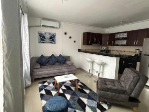 Lujo y Conexión Apto con Aire, WiFi y Comodidad Total en el Caney