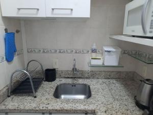 Apartamento a uma quadra do Mar comvaga de garagem