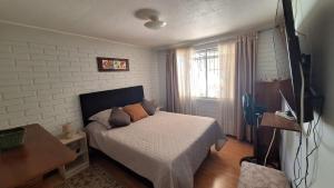 Casa cómoda y acogedora en barrio residencial