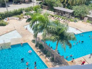 Loft con Piscinas, Salida a la Playa y Y AC