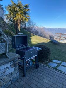 Casa dello Scoiattolo immersa nel verde con vista lago