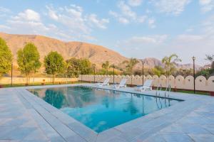 Royal Rajasthani Haveli with Private Pool by Ozy Stays