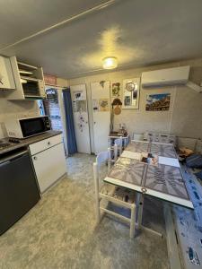 Mobilhome situé côté ville et côté campagne