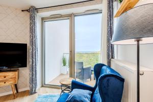 Apartament przy plaży z balkonem i widokiem na morze